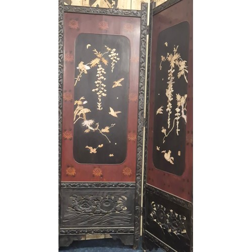 182 - A Large Japanese four fold room divider screen. Each panel being hand carved, lacquered and showing ... 