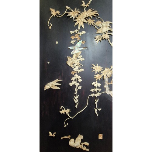 182 - A Large Japanese four fold room divider screen. Each panel being hand carved, lacquered and showing ... 