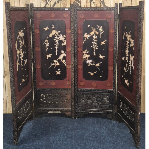 182 - A Large Japanese four fold room divider screen. Each panel being hand carved, lacquered and showing ... 