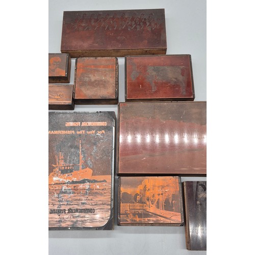 91 - A Collection of antique printing blocks; Commercial fishing advertising, Queen seated with family, m... 