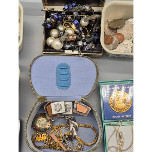 90 - A Collection of mixed jewellery and coins; Silver pendant and chain, cuff links, silver rings and va... 