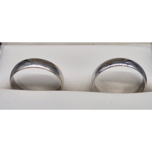 31 - A Lot of two 9ct white gold wedding bands. [Ring size K 1/2] [3.85grams]