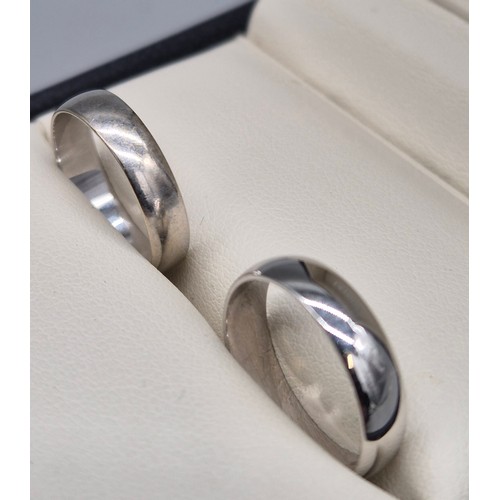 31 - A Lot of two 9ct white gold wedding bands. [Ring size K 1/2] [3.85grams]