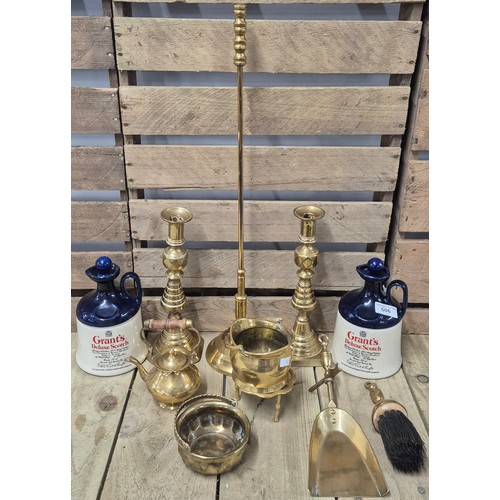 506 - A collection of brass ware & two Grants Deluxe scotch Decanters