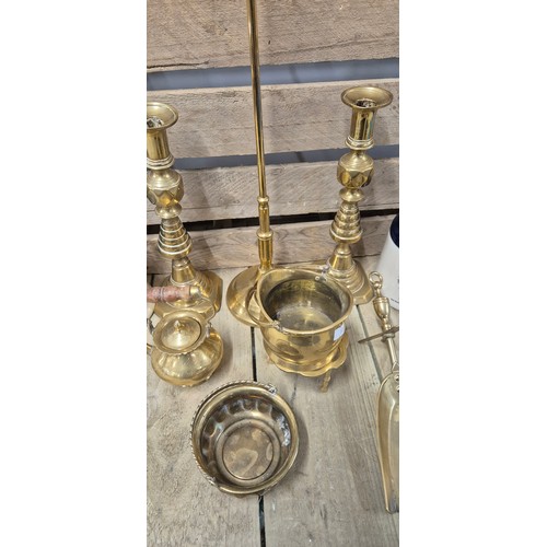 506 - A collection of brass ware & two Grants Deluxe scotch Decanters