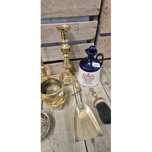 506 - A collection of brass ware & two Grants Deluxe scotch Decanters