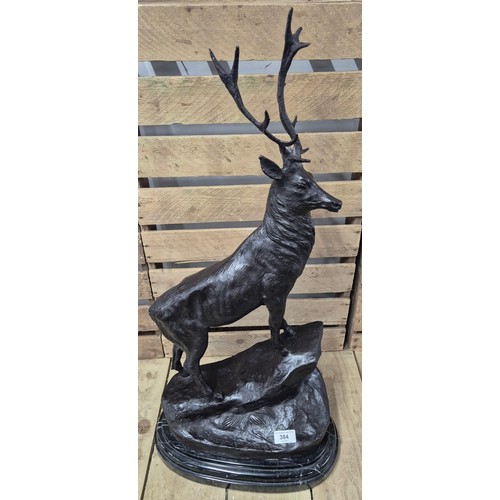 384 - After Jules Moigniez [1835-1984]
A Large reproduction patinated Bronze sculpture of a highland stag.... 