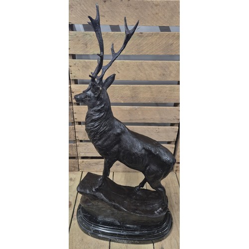 384 - After Jules Moigniez [1835-1984]
A Large reproduction patinated Bronze sculpture of a highland stag.... 