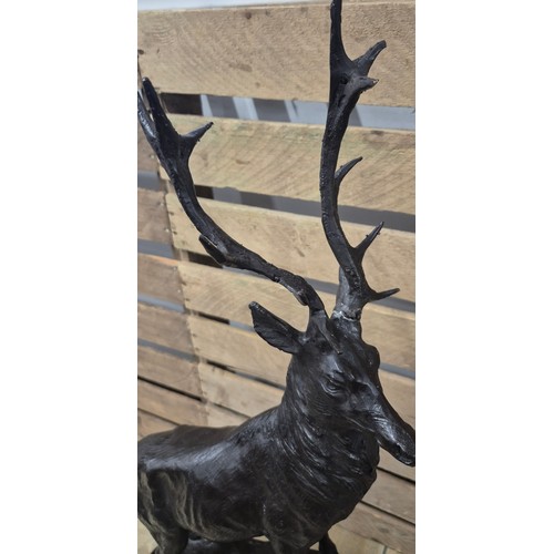 384 - After Jules Moigniez [1835-1984]
A Large reproduction patinated Bronze sculpture of a highland stag.... 