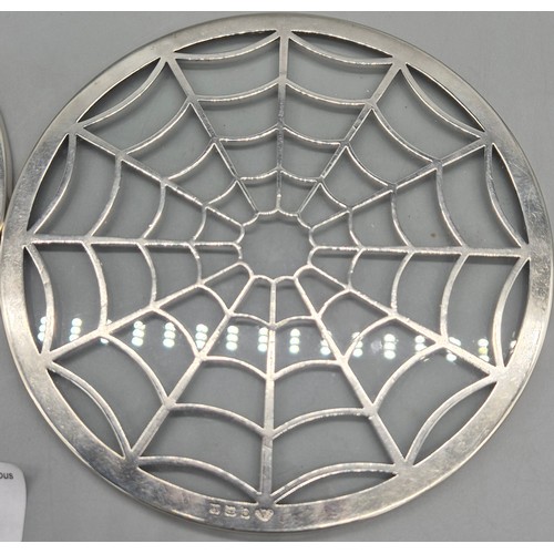 60 - Pair of Birmingham silver and glass resting trays. Produced by Adie Brothers. [15.5cm diameter]