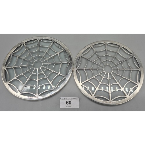 60 - Pair of Birmingham silver and glass resting trays. Produced by Adie Brothers. [15.5cm diameter]