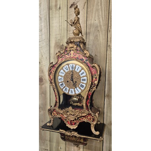 379 - Large French Boulle and ormolu mounted mantle clock. Comes with bracket wall shelf. [Clock- 80cm hig... 