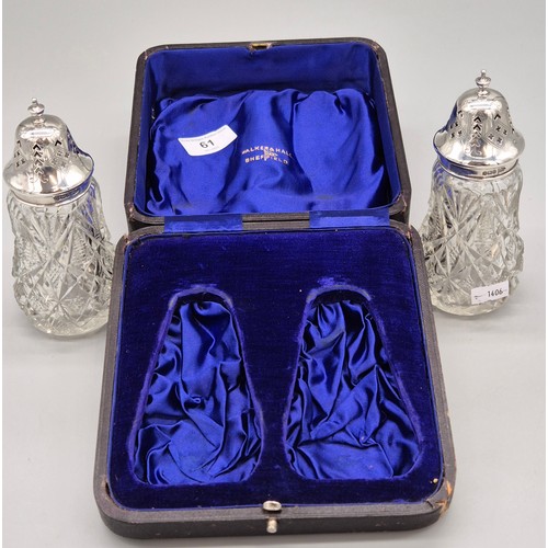 61 - A Pair of boxed Sheffield silver and cut crystal sugar sifters. Produced by Walker and Hall. Dated 1... 