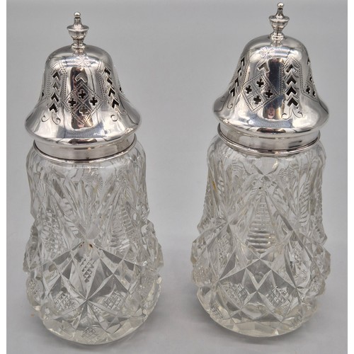 61 - A Pair of boxed Sheffield silver and cut crystal sugar sifters. Produced by Walker and Hall. Dated 1... 