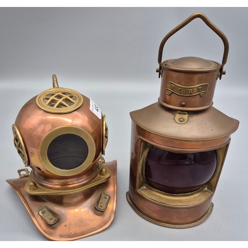 432 - Copper and brass miniature diving helmet. Together with A Copper Ships Port lantern. [Lantern 21cm h... 