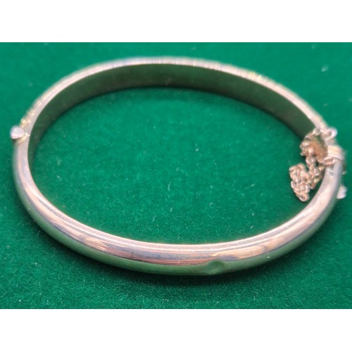 34 - Chester 9ct yellow gold engraved bangle. Dated 1899. [8.58grams]