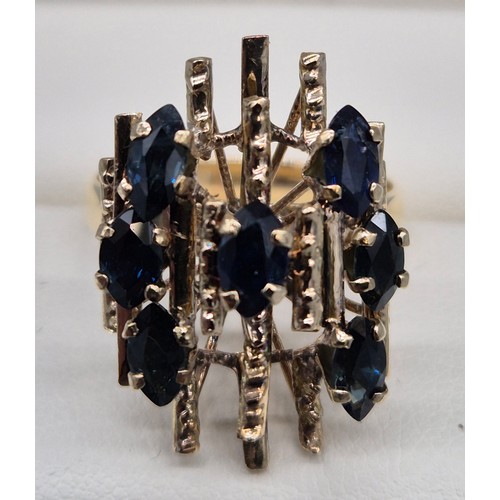 35 - 18ct yellow gold and Sapphire stone modernist ring. [Ring size P] [4.86Grams]