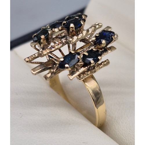 35 - 18ct yellow gold and Sapphire stone modernist ring. [Ring size P] [4.86Grams]