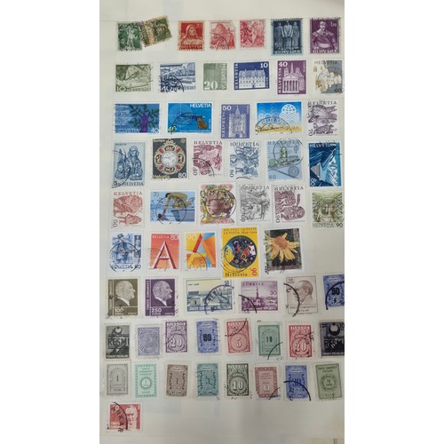 319 - Album containing a large quantity of mixed world stamps.