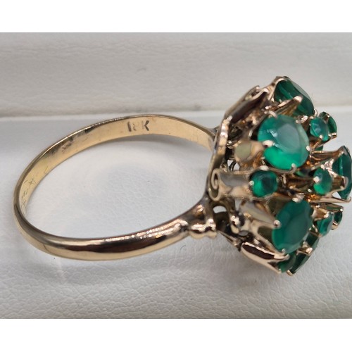 37 - 18ct yellow gold and Emerald Bombe ring. [Ring size U] [5.46grams] [Missing one stone]