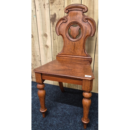 381 - 19th century church style hall chair with carved backing