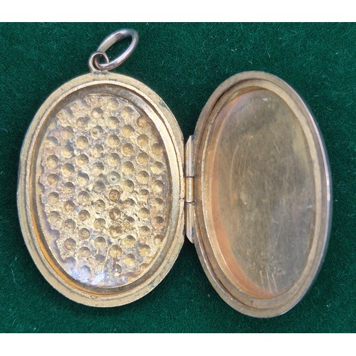 39 - 9ct yellow gold back and front diamond locket. Engraved with 