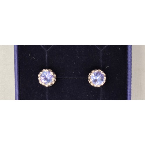 17 - A Pair of 9ct white gold earrings fitted with round cut blue Tourmaline gem stones. [2grams]