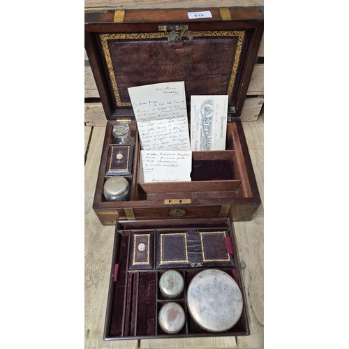 419 - 19th century mahogany and brass bound jewellery box containing lidded preserves. [13x30x22cm]