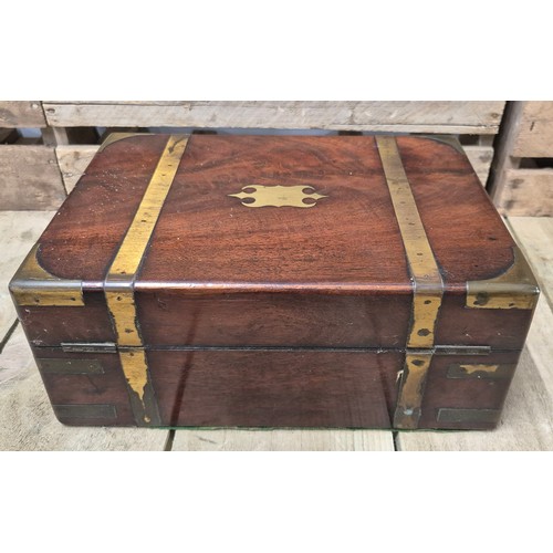 419 - 19th century mahogany and brass bound jewellery box containing lidded preserves. [13x30x22cm]