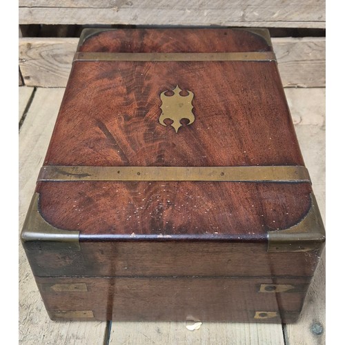 419 - 19th century mahogany and brass bound jewellery box containing lidded preserves. [13x30x22cm]