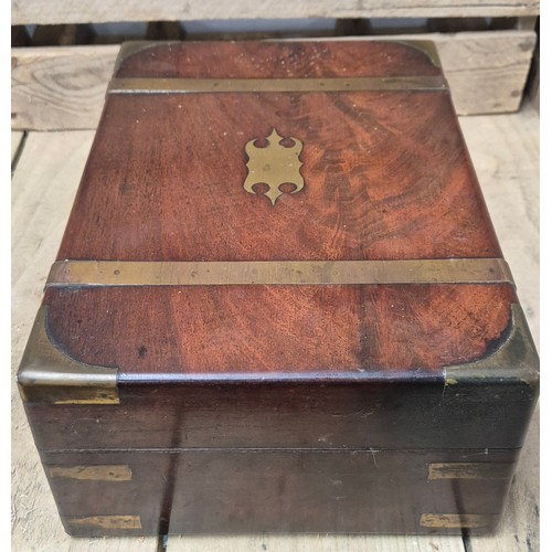 419 - 19th century mahogany and brass bound jewellery box containing lidded preserves. [13x30x22cm]