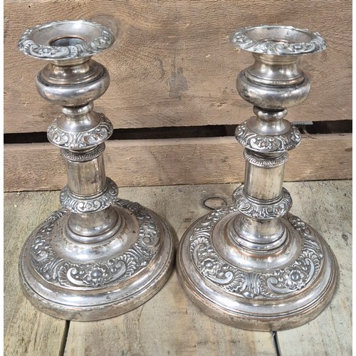 417 - A Large antique E.P Two handle ornate serving tray together with two pairs of candlesticks