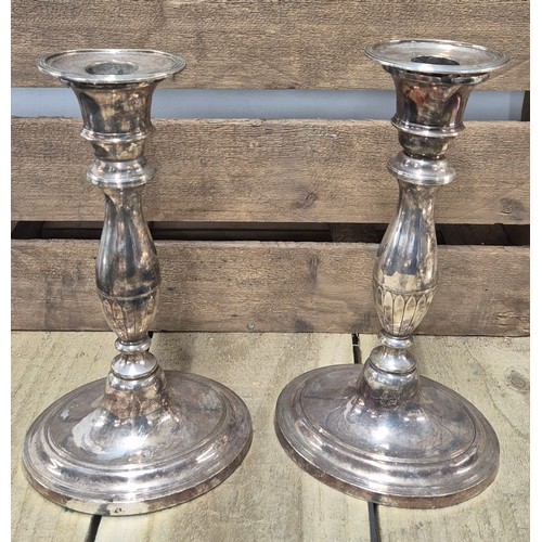 417 - A Large antique E.P Two handle ornate serving tray together with two pairs of candlesticks