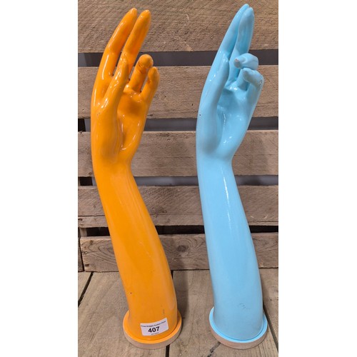 407 - A Pair of mid century style hand mannequin's [43cm high]