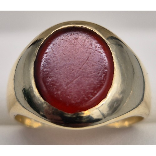 15 - Antique 9ct yellow gold signet ring. Fitted with an oval agate stone. [Ring size O] [7.18Grams]