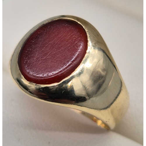 15 - Antique 9ct yellow gold signet ring. Fitted with an oval agate stone. [Ring size O] [7.18Grams]