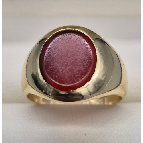 15 - Antique 9ct yellow gold signet ring. Fitted with an oval agate stone. [Ring size O] [7.18Grams]