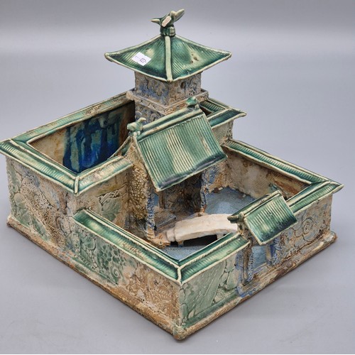 479 - A Porcelain green glazed pottery Chinese court yard villa building. [21x24x28cm]