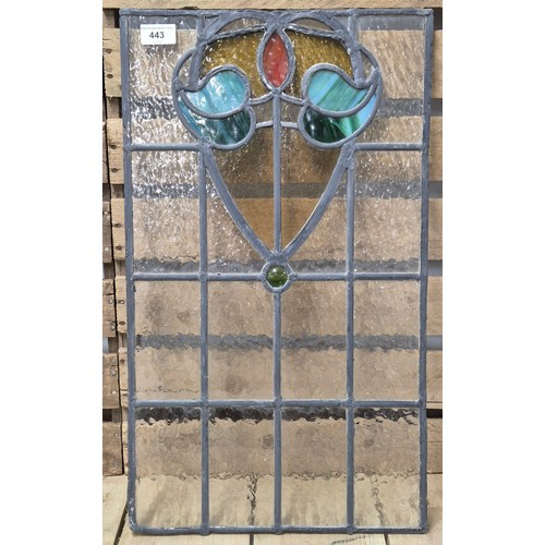 443 - A Stainglass window section. [59x34cm]