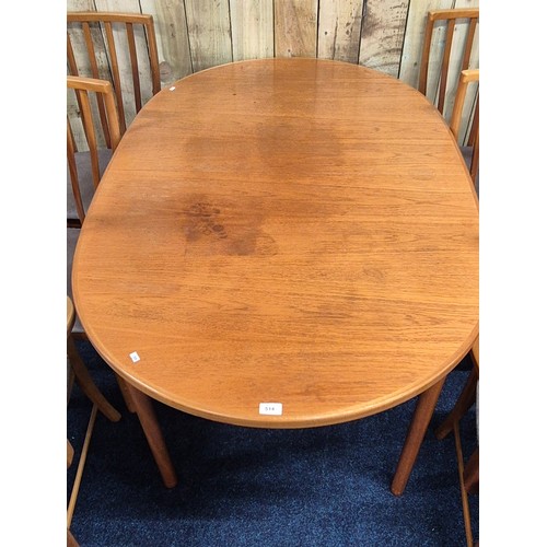 514 - Mid century McIntosh Kirkcaldy Teak Dining room Table Consisting of Two carver arm chairs & Four upr... 