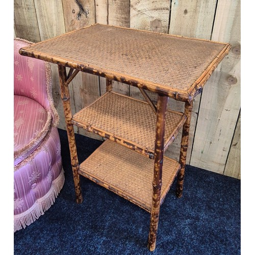 521 - Two items of furniture; Mid century bedroom chair and Victorian bamboo design two tier table.