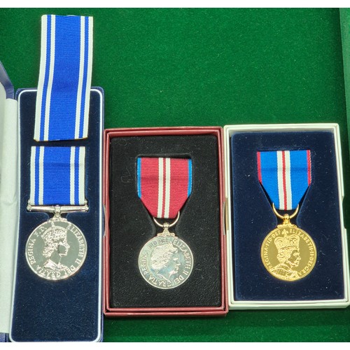 20A - Three boxed Police medals; Police Long service and good conduct medal. The Queens Gold & Diamond Jub... 