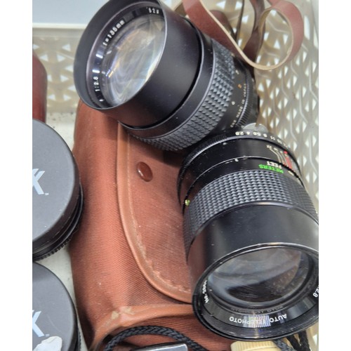 550 - A Basket of mixed cameras and binoculars; Theatre glasses, Kodak cameras and various lenses.