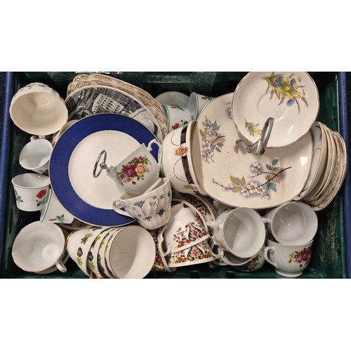 555 - Three crates of tea ware and ceramics; Wedgwood collectors plates, Royal Stafford tea set, Ansley ro... 