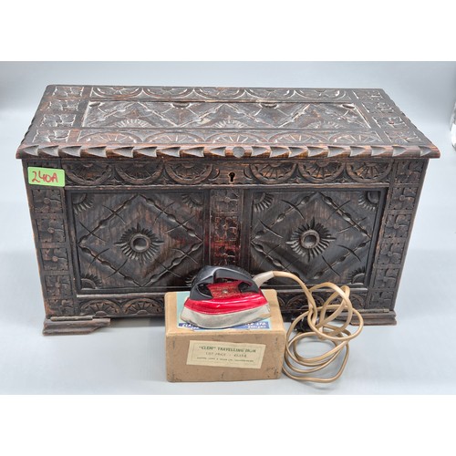 240A - Antique hand carved oak smokers chest together with a small vintage travel iron.