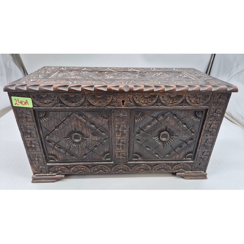 240A - Antique hand carved oak smokers chest together with a small vintage travel iron.