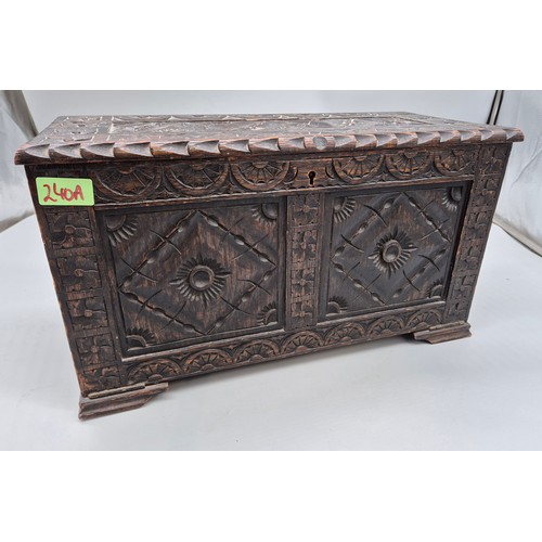 240A - Antique hand carved oak smokers chest together with a small vintage travel iron.