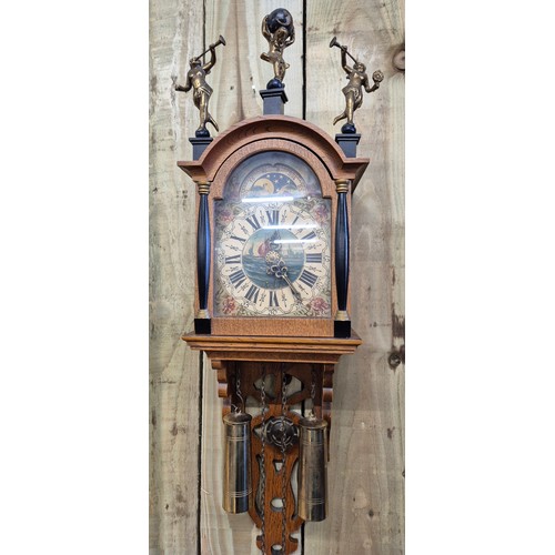 522A - German wall clock, comes with pendulum and weights.