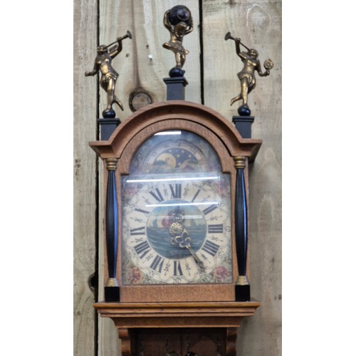 522A - German wall clock, comes with pendulum and weights.