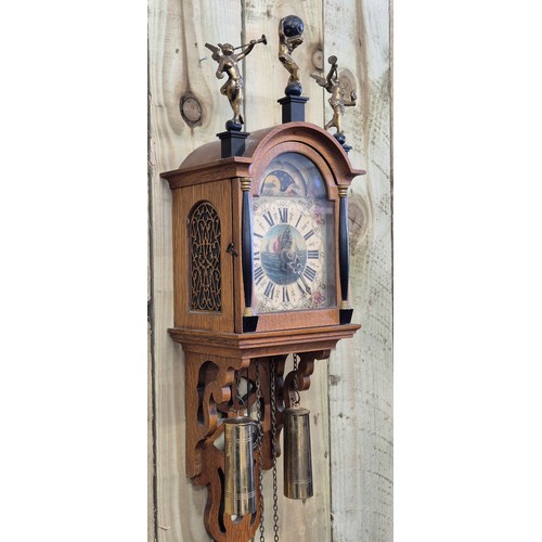 522A - German wall clock, comes with pendulum and weights.